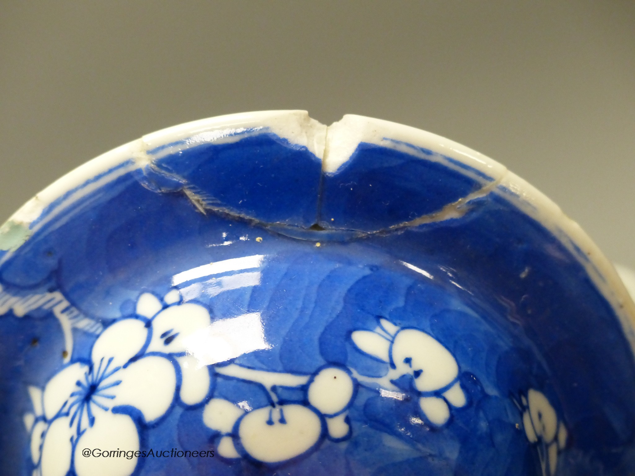 A pair of Chinese blue and white 'dragon' bottle vases, a prunus jar and cover, all late 19th century